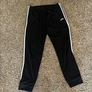 Adidas Black and White Track Pants with Iconic Stripes
